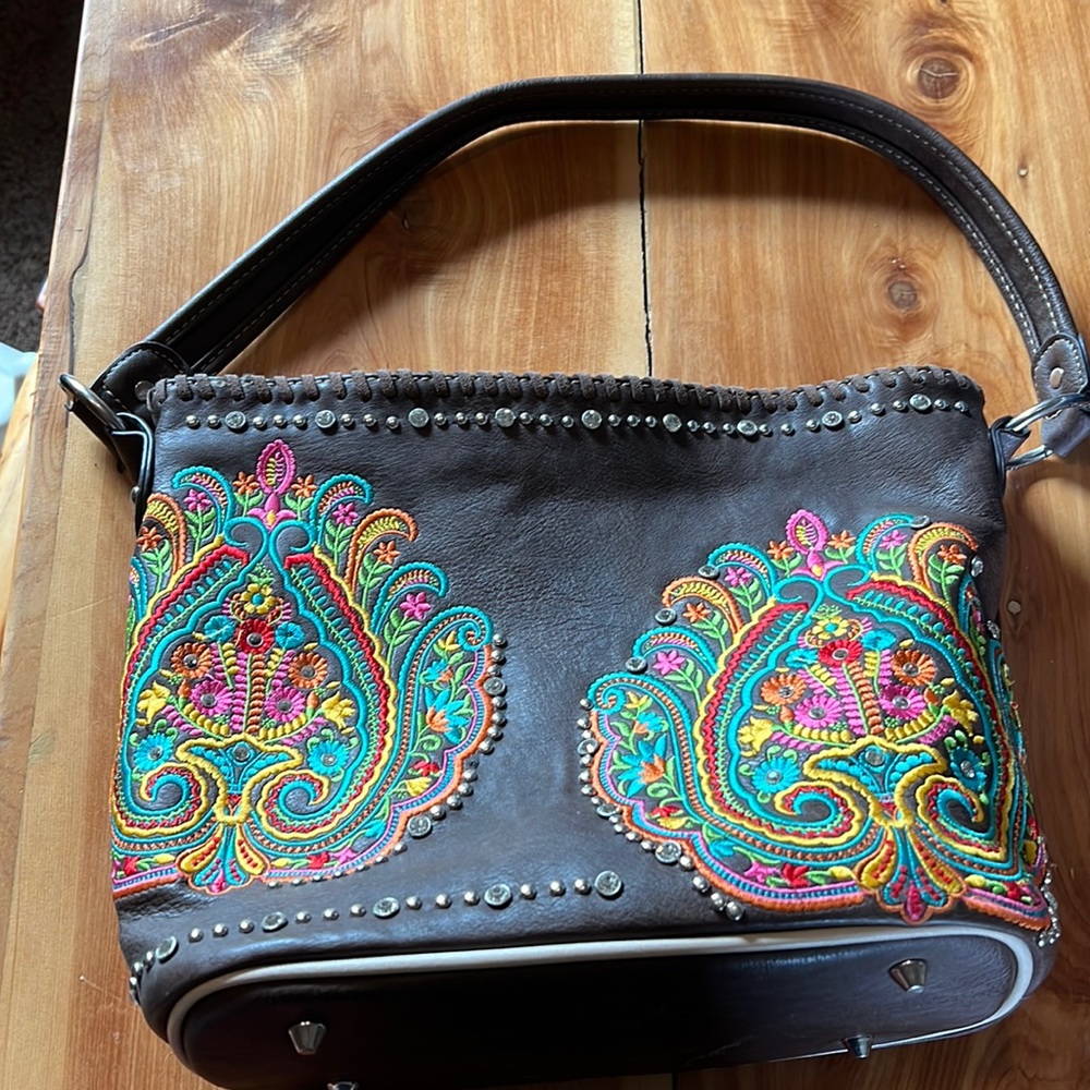 Montana West faux leather purse with concealed carry pocket.